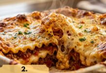 Four Cheese Volcano Lasagna (Ultra Cheesy Lasagna Recipe) Four Cheese Volcano Lasagna with molten cheese center bubbling from golden baked top